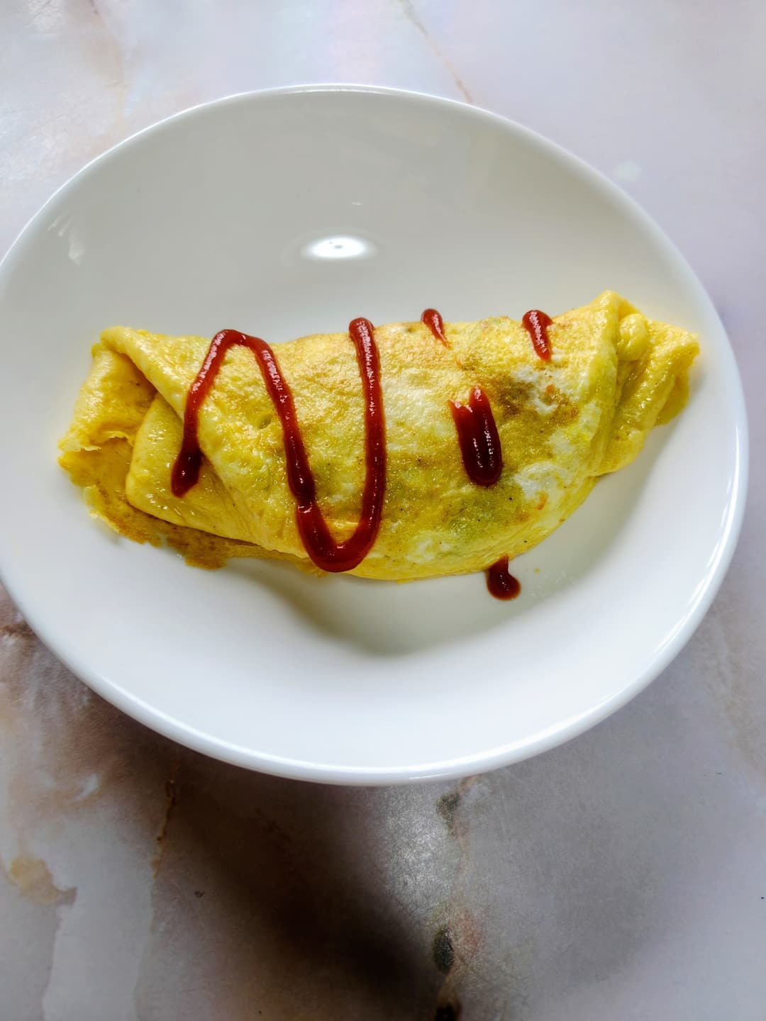 スパゲッティナポリタンの玉子包み焼きの完成写真